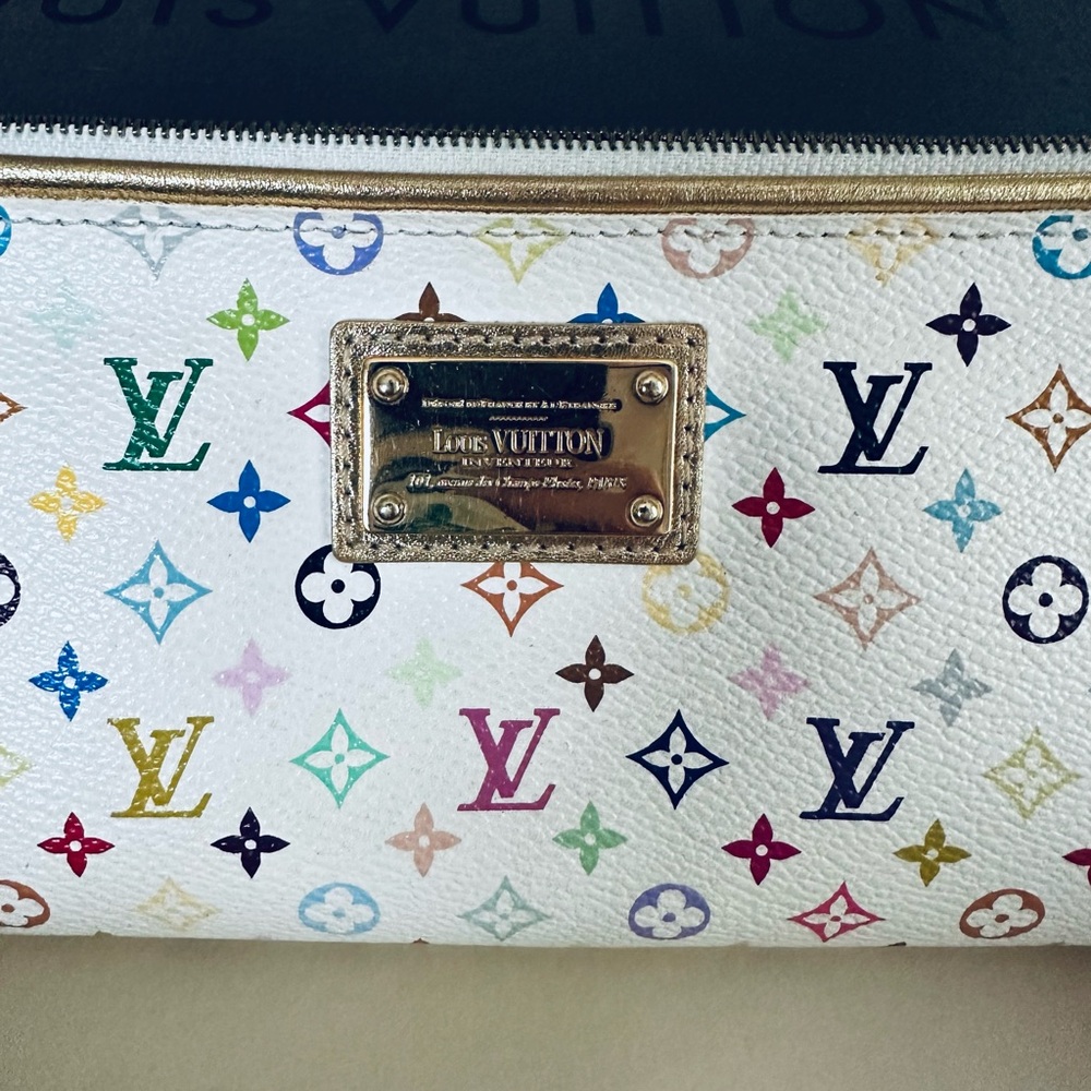 Louis Vuitton authentic Kate 2009 wristlet bag - Blanc multicolour